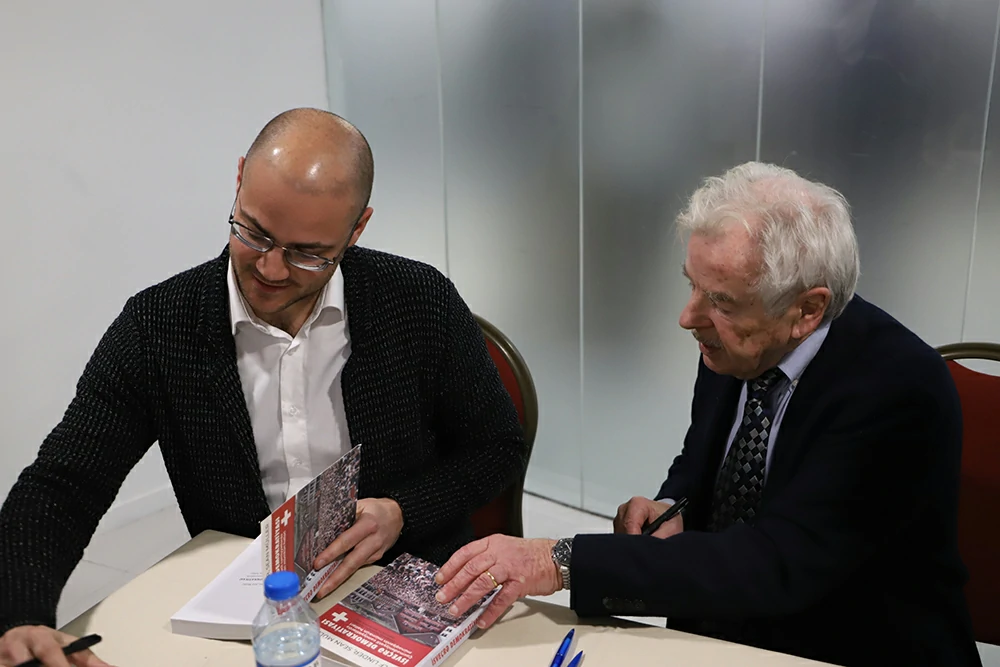 Book signing after Kitabistan Talk. Education in Switzerland and Swiss Democracy.